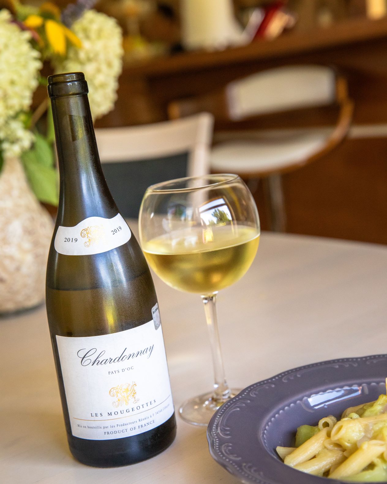 Pays d'Oc Chardonnay Bottle and Glass with Pasta Dish