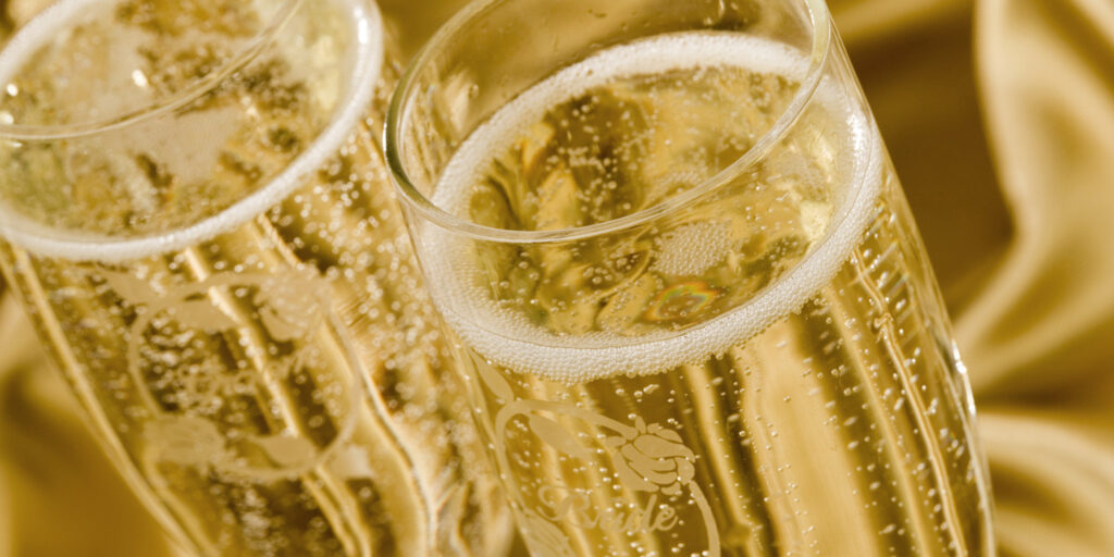 Champagne filled wedding glasses